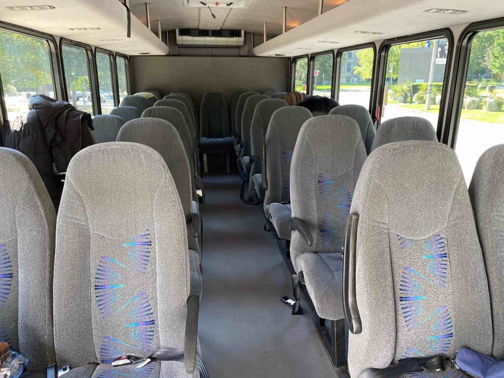 The interior of the 29 passenger coach bus being used for the Canoe Bus service. 