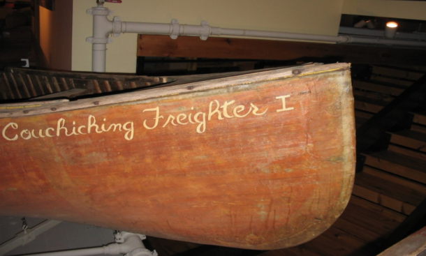 Close up of the painted on name "Couchiching Freighter I" on the bow of a canoe