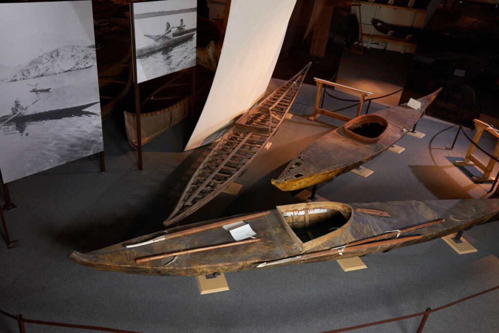 Three canoes on display