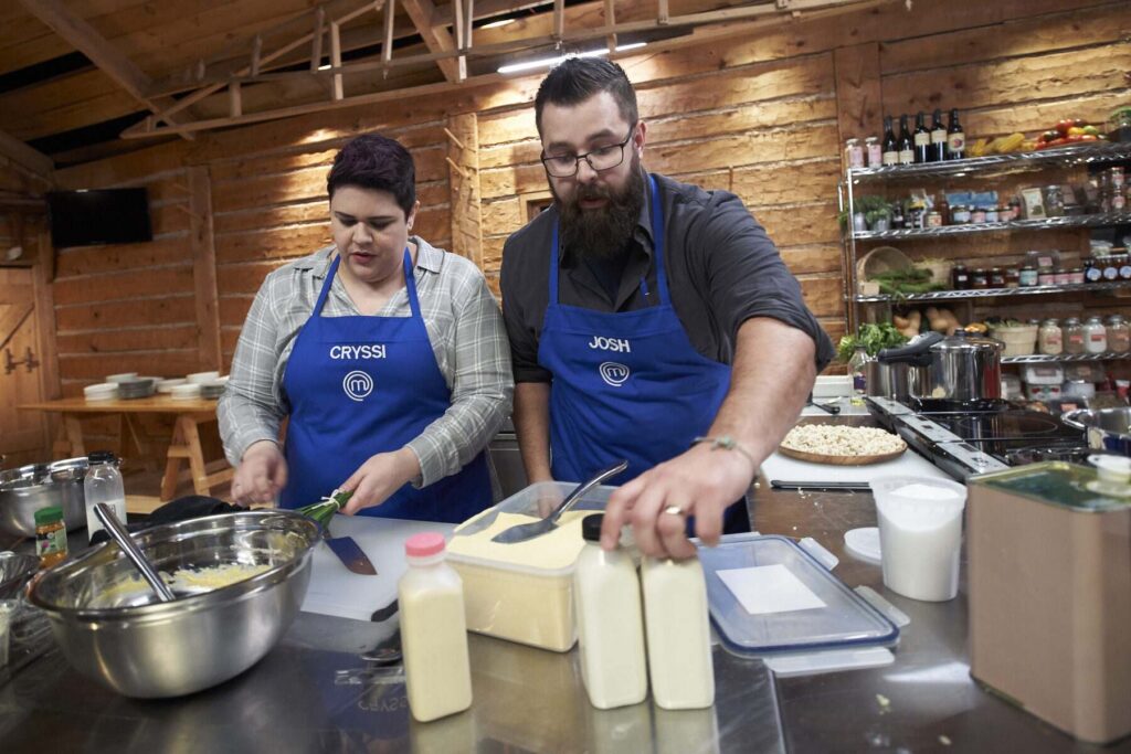 Two chefs preparing a meal