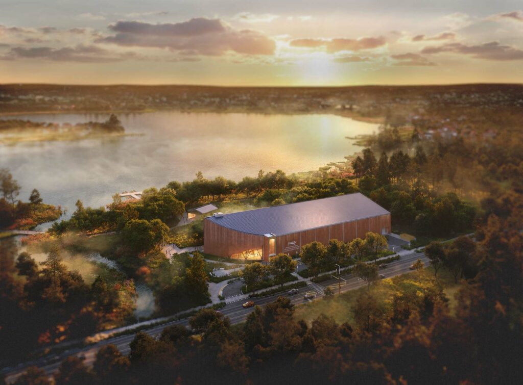 An aerial concept render of the new museum along Ashburnham Drive, with Little Lake in the background.