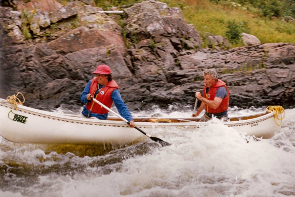 Shelagh and Jon Grant riding the rapids together on one of their many canoe trips.